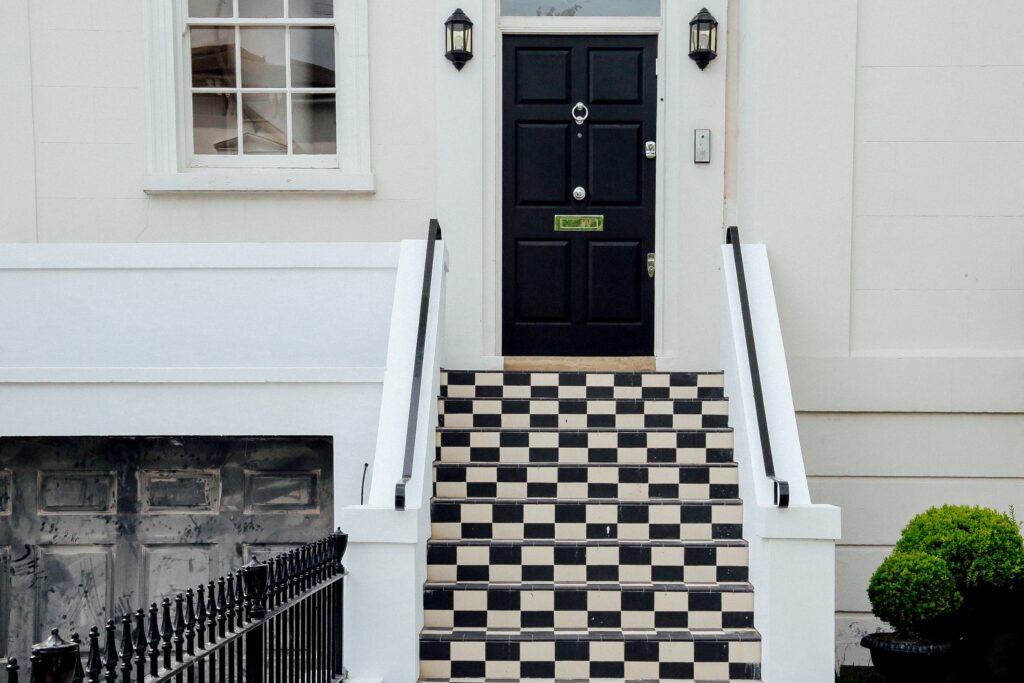 White house, black door, black and white steps